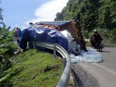 Listing to one side, this truck toppled on Phuket's Patong Hill today