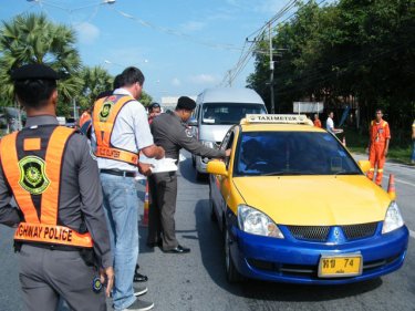 Highway Patrol and Transport officers stop taxis for checks