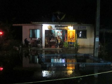 An officer waded out in gumboots to greet Phuketwan at this station