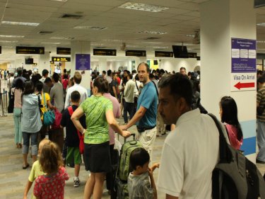 People remain willing to risk long queues to visit Phuket