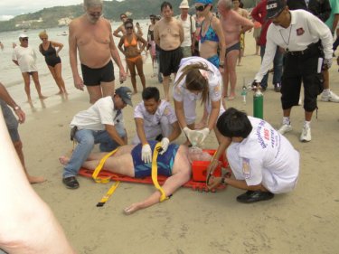 An elderly Swedish tourist is rescued by lifeguards then treated by paramedics after succumbing to cramp. She was quickly back on her feet after getting the all-clear at Patong Hospital
