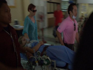 A young tourist is transferred to another hospital on Phuket today
