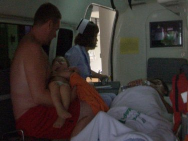 Patients being transferred from Patong Hospital to Phuket City yesterday