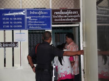 Gamblers are booked at Chalong Police Station last night