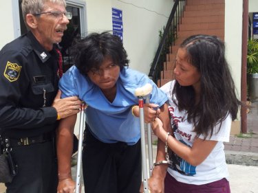 The couple are helped today after their arrest in Phuket City last night