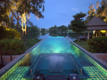 A Banyan Tree villa pool by night . . . popular for small gatherings