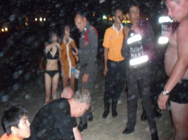 Night swimmers gather as efforts are made to revive the tourist last night