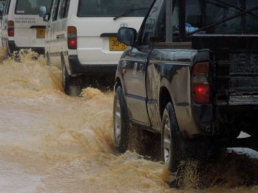 Water splashes as traffic ploughs through roads in southern Phuket today