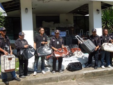 Customs officers with the fake luggage on Phuket today