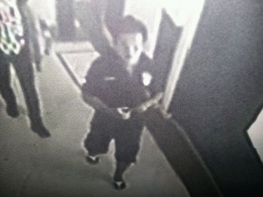 A security camera snapshot of the mobile telephone theft suspect