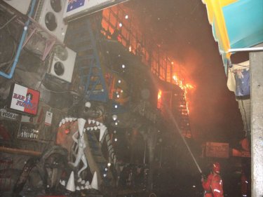 The fire at the Tiger Disco burst from the venue in Patong early today