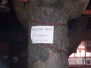 A sign at one of the bars below the charred Tiger Disco in Patong