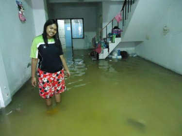 This Phuket Cty resident woke up today to find her home flooded
