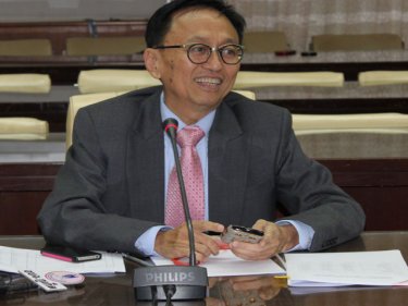 Phuket's Paiboon Upatising in trademark pink tie at Friday's meeting