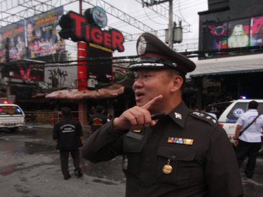 Kathu Police Superintendent Jirapat Polchanaphan outside the Tiger Discotheque in Soi Bangla, Patong, on the day of the blaze