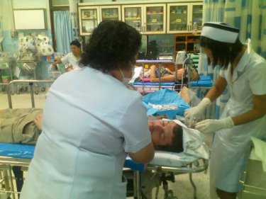 An injured passenger being treated at a local Phang Nga hospital today