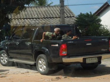 Armed hunters in a pickup setting out north of Phuket yesterday