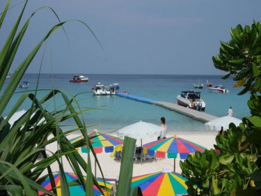 Island in distress . . . the beauty belies the pollution on Racha, off Phuket