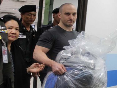 Briton Lee Aldhouse is extradited and escorted back to Phuket  last year