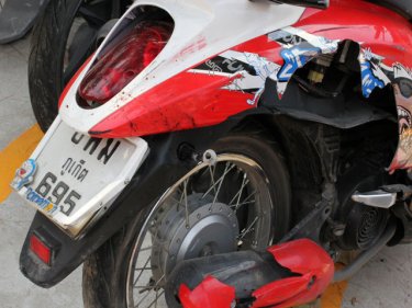 The motorcycle used in the bag snatch, hit by an oncoming vehicle