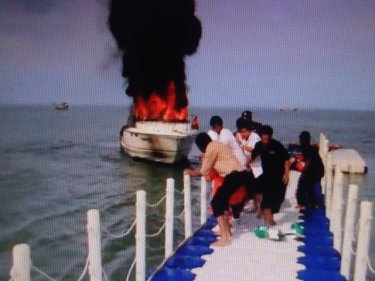 Boat goes to blazes: there's not much firefighters can do north of Phuket