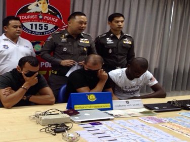 The three ATM fraud suspects  presented to the media on Phuket today