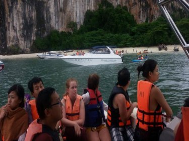 Tourists being taken off Hong island yesterday after the storm