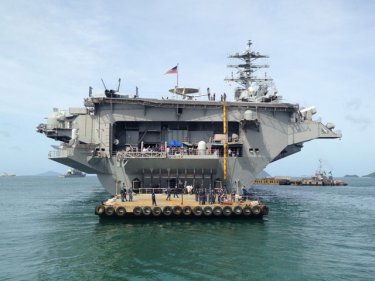Here we go . . . moving close to the USS Nimitz off Phuket today