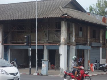The timber panels, redolent of Old Phuket Town's bygone years