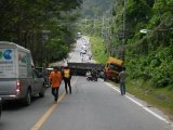 Phuket Coast Road Traffic Halts: Truck Crashes into Ditch, Load Blocks Road