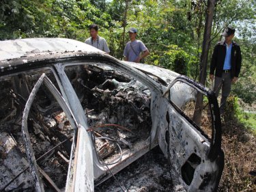 Burnt-out remains of the car from which the Russian escaped today