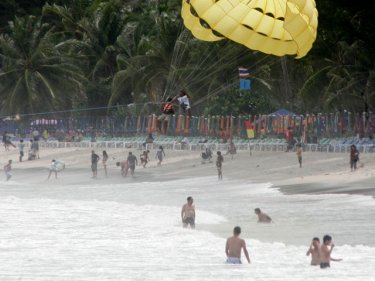 Patong beach, often crowded with parasailers and jet-skiers