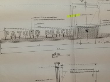 Plans for the PATONG BEACH sign, accompanied by a large TV screen