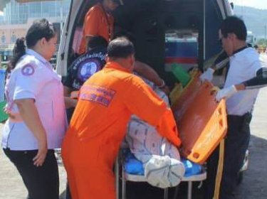 The Chinese man's body is brought to shore on Phuket today