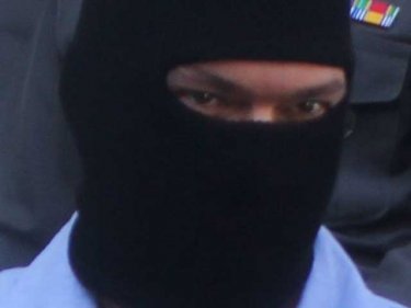 Moshe David preferred to wear a balaclava in public after his arrest
