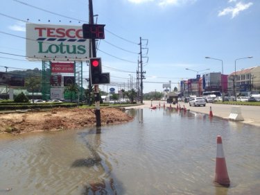 Phuket's  Tesco Lotus intersection was flooded yesterday