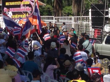 Protesters flocked by the hundreds to show their dissent on Phuket today