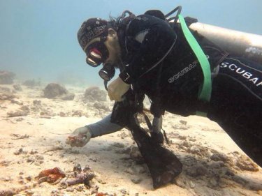A diver examines the devastation on the bottom off Phuket's Racha island