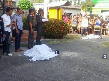 The bodies of the man and the woman in the street today