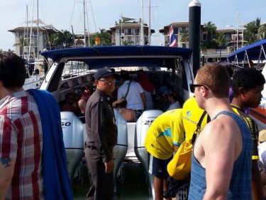 Marine Police check a speedboat at Royal Phuket Marina today