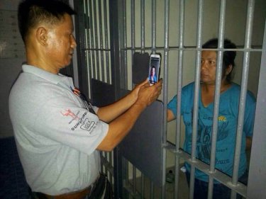 Sukanya Jantanarak is photographed behind bars on Phuket