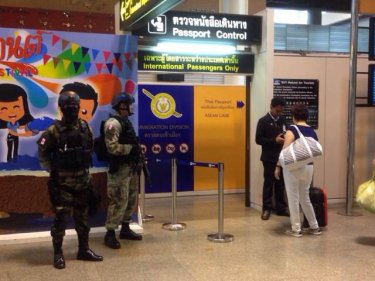 Soldiers on duty yesterday at Bangkok's Don Muang International Airport