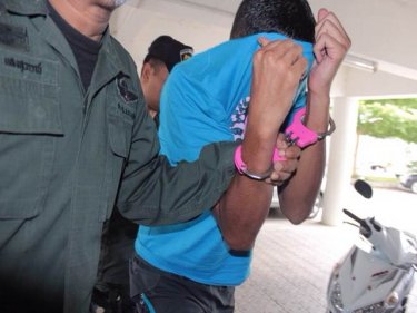 Frenchman Naci Jawad is brought to Phuket Police Headquarters today
