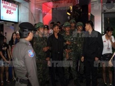 The two Navy sailors are arrested at the pub bar early today in Pattaya