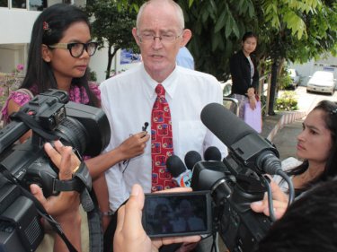 Khun Chutima and Morison after being held in court cells for five hours in April