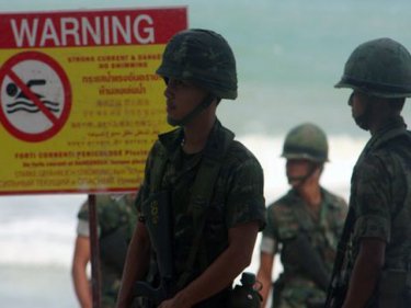 Uphold the law: Soldiers patrol Patong beach as Phuket enforces regulations