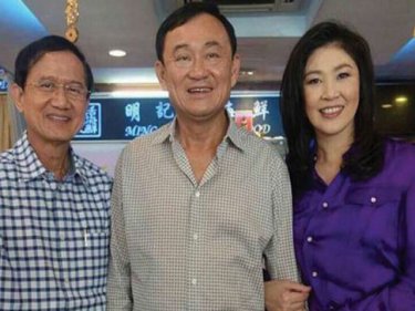 Former Thailand premiers all in the family: Thaksin poses with sister Yingluck Shinawatra and brother-in-law Somchai Wongsawat in Singapore