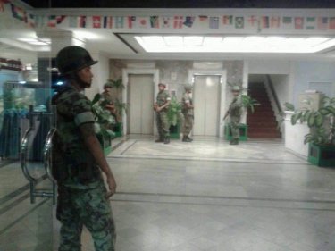 Navy personnel take over a hotel favored by gamblers in Phuket Town