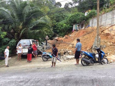 Part of a landslip that damaged cars in Patong during floods today