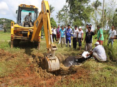 A buffalo named Tin is saved today from a disused Phuket well